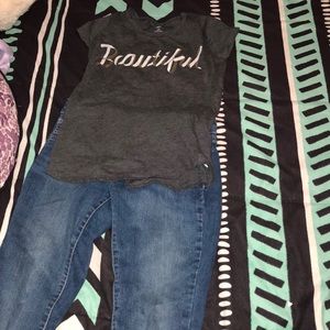 A cute outfit! Jeans with a stylish shirt.